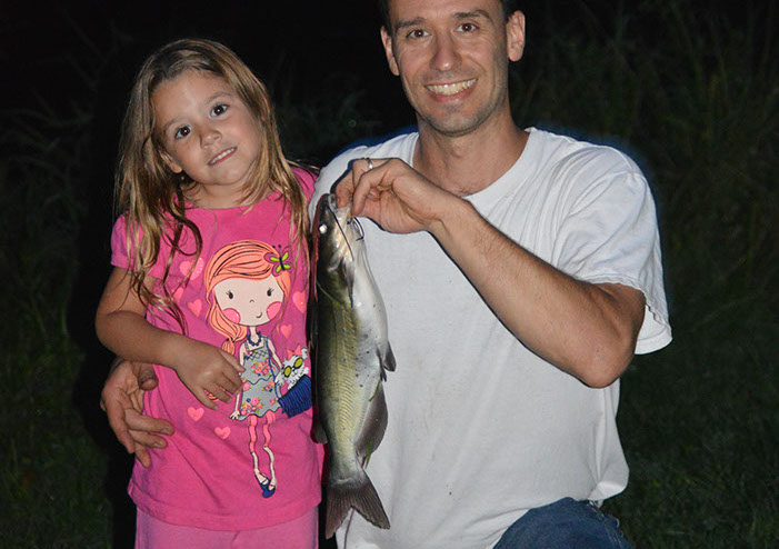 Catch fish at this cabin rental with fishing pond.